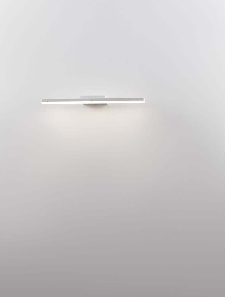 Nyx LED Wandleuchte 3000K IP44 an einer Wand, minimalistische Design mit neutralweißem Licht.