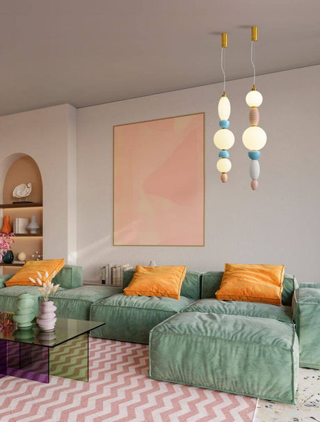 Obrie LED Pendel 3-pære Ø 20cm 3000K guld, orange, blå, hvid i moderne stue.
