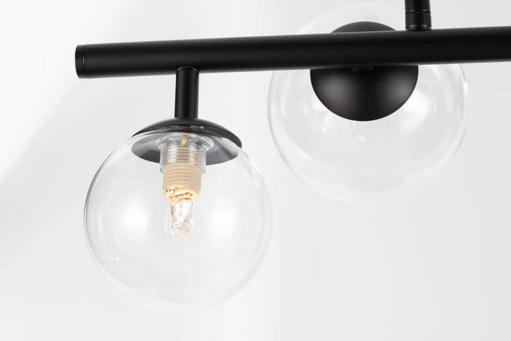 Odillia Pendelleuchte G9 7-flammig mit transparentem Opalglas und mattschwarzem Metall.