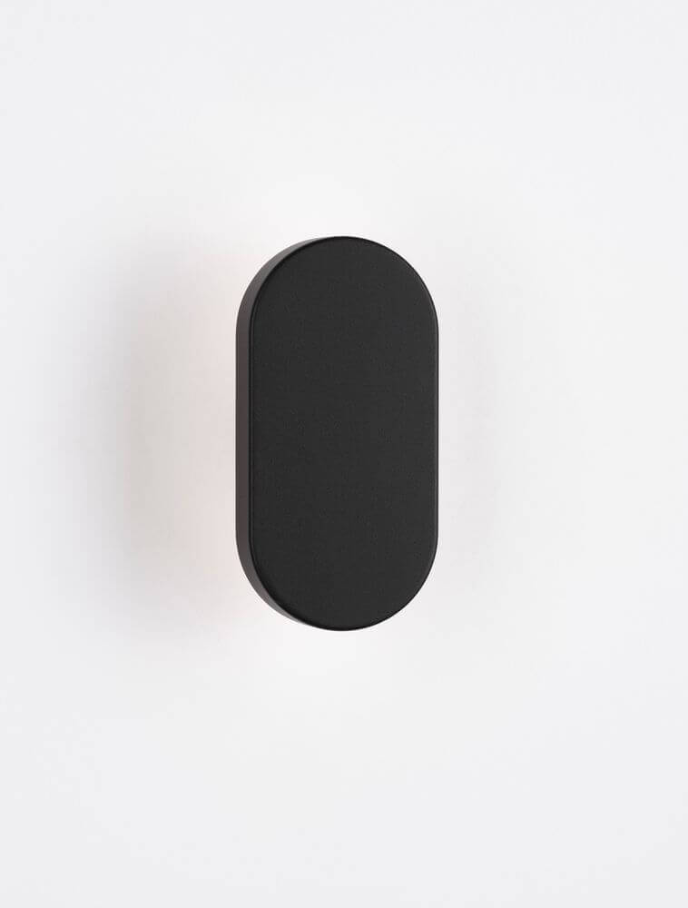 Ofir LED Außenwandleuchte 3000K Schwarz IP54 an einer Wand montiert, modernes Design und elegante schwarze Oberfläche.