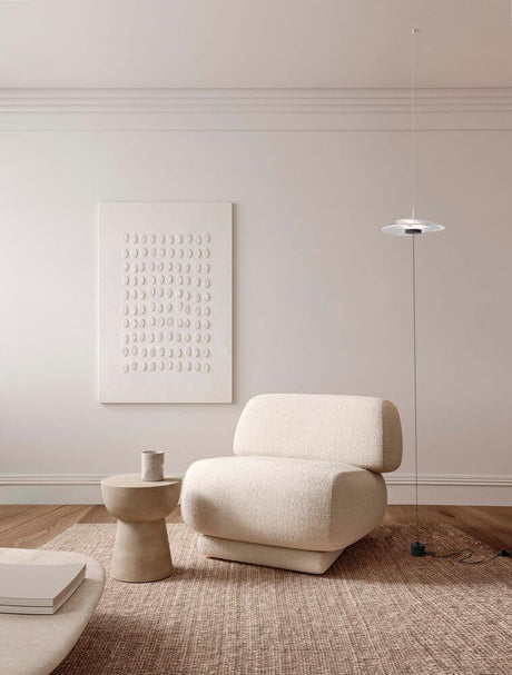 Olea LED plafonnier Ø 35 cm 3000K fiche secteur blanc,noir au-dessus d’un canapé scandinave-chic moderne.