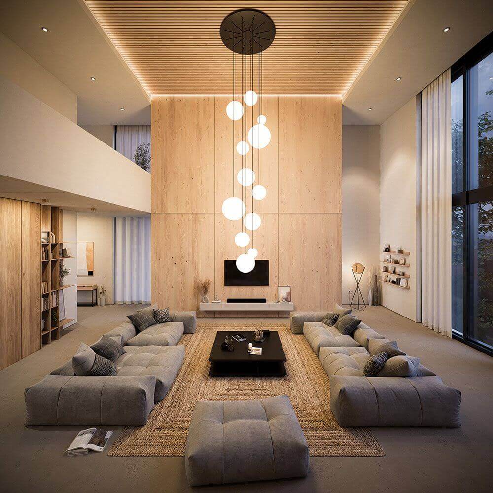 Helles modernes Wohnzimmer mit beigem Sofa, Holzwänden und stilvoller Beleuchtung.