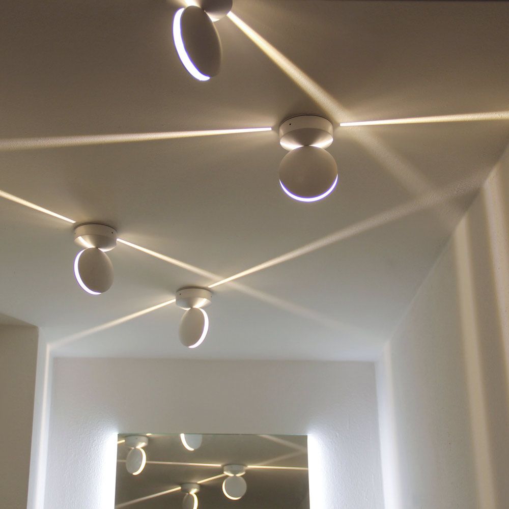 Moderne Maia LED-effekt utendørs vegglampe 100 lm hvit med unike lyseffekter i interiøret.