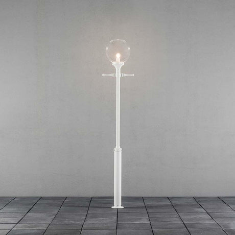 Orion golvlampa vit, klart akrylglas på grå bakgrund, modern design för stiliga inomhusmiljöer.