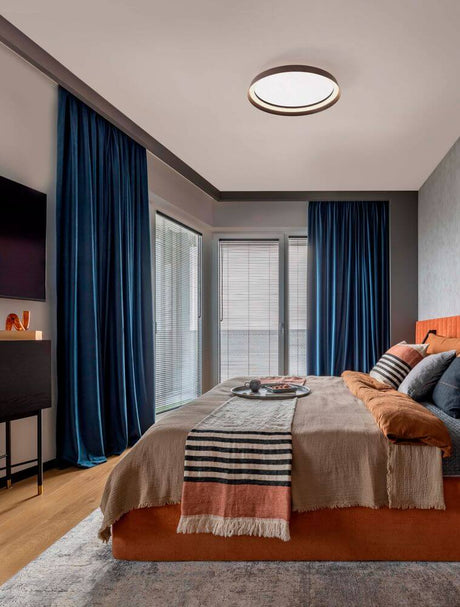 Intérieur moderne avec plafonnier Ormi Ø 45 cm 2700, 4000 K dans la chambre à coucher