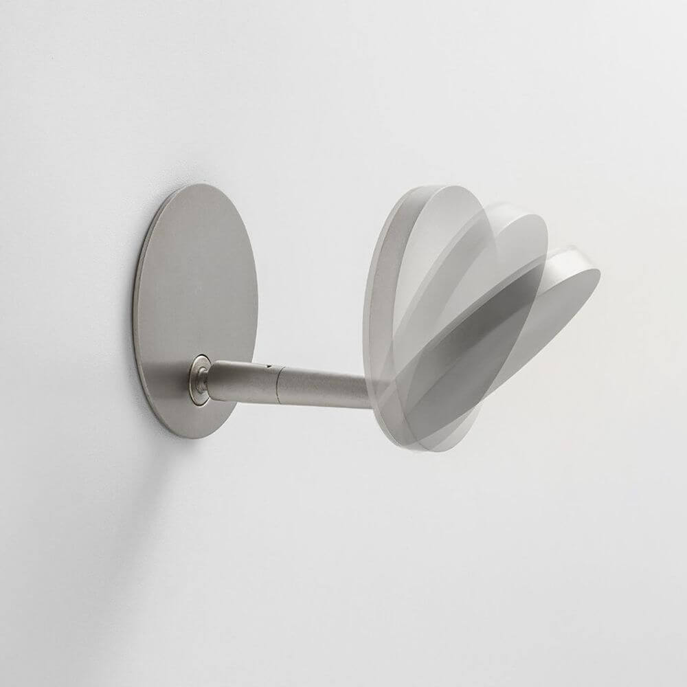 Panzeri Bella built-in LED wall lamp touch switch with a swivel lamp arm and a rotatable lamp head.