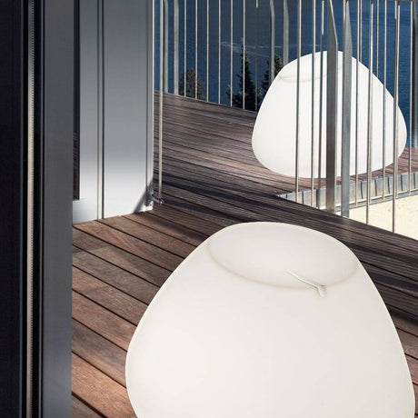 Panzeri Potter outdoor seat with lighting RGBW on a terrace with a beautiful view.