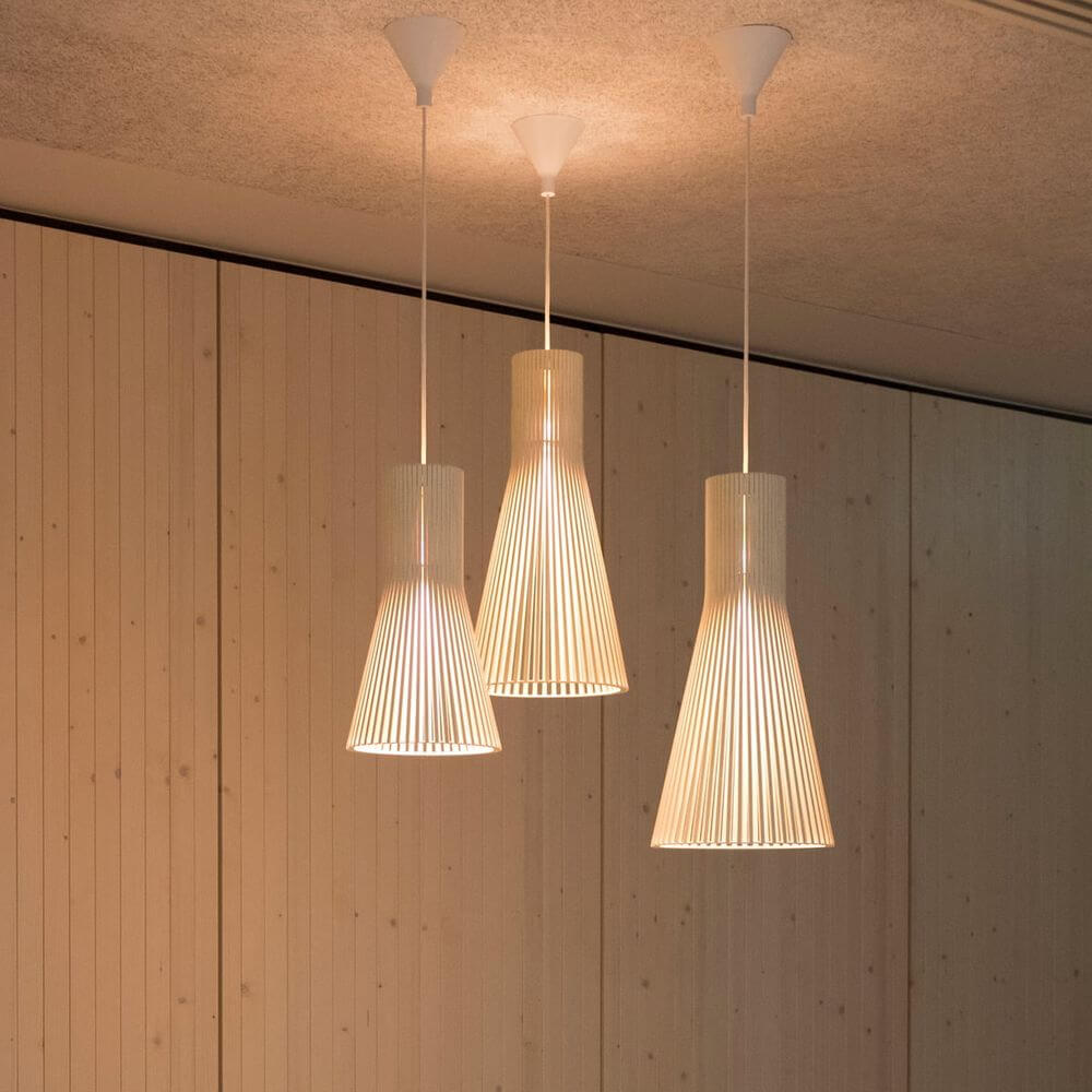 Pendelleuchte Secto Small 4201 aus Holz Ø 25cm in modernem Design mit sanftem Licht.