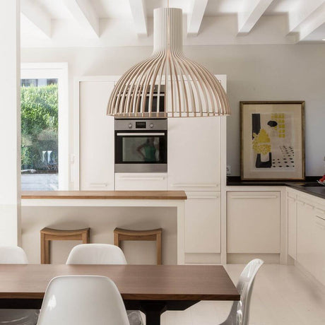 Victo 4250 pendant light made of wood Ø 56 cm in a modern kitchen setting with an elegant, Scandinavian design.