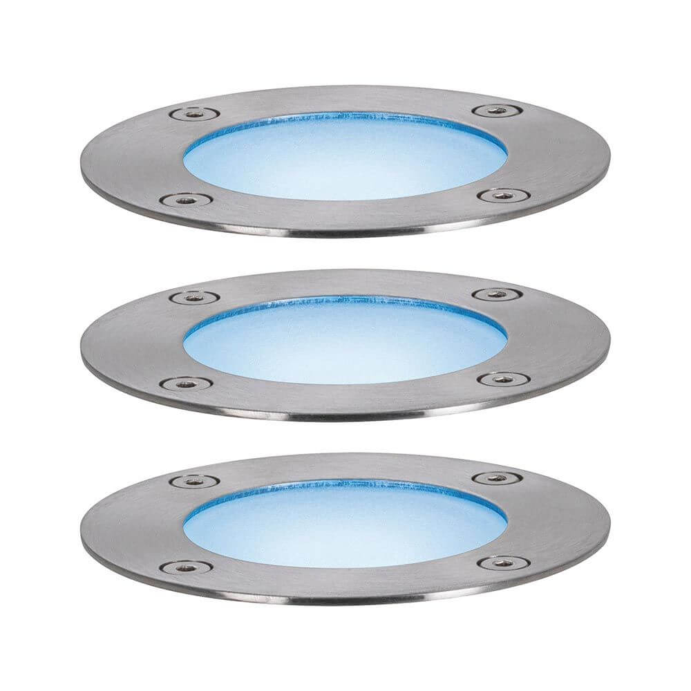 Set aus drei runden Plug & Shine LED Bodeneinbaustrahlern mit blauem Licht für Gartenbeleuchtung.