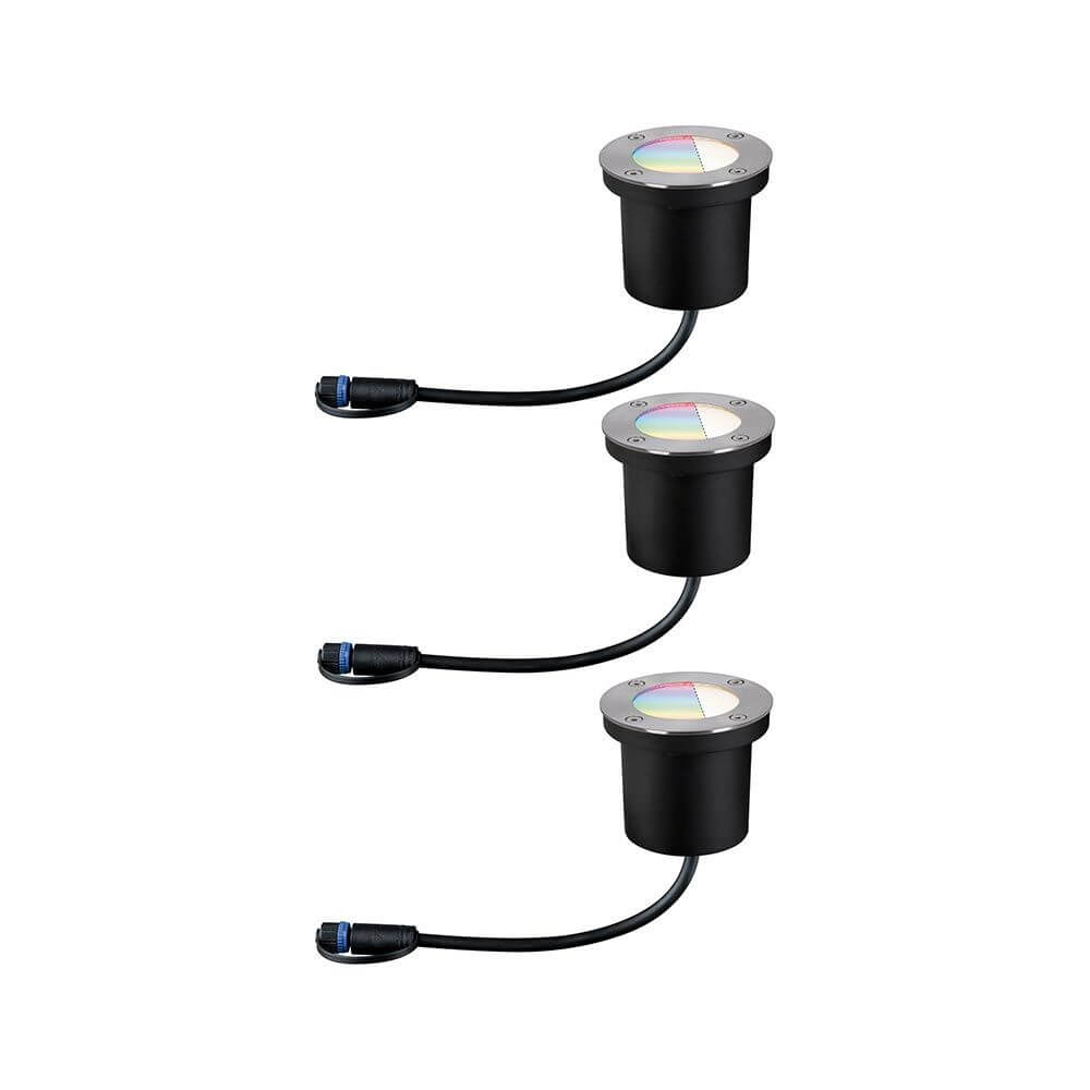 Set von drei runden Plug & Shine LED Bodeneinbaustrahlern für Gartenbeleuchtung.