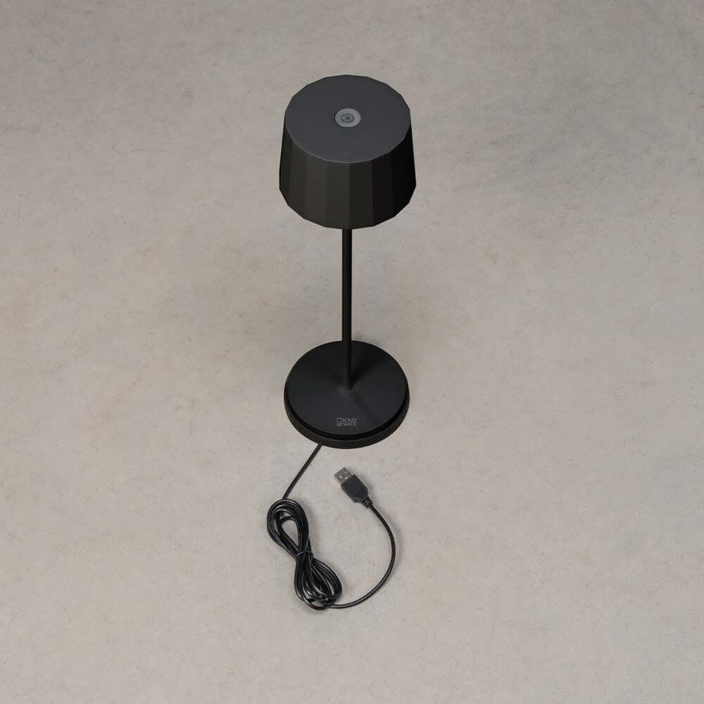 Positano Outdoor LED Akku Tischleuchte in Schwarz mit USB-Kabel, dimmbar und in 2700 oder 3000 Kelvin erhältlich.