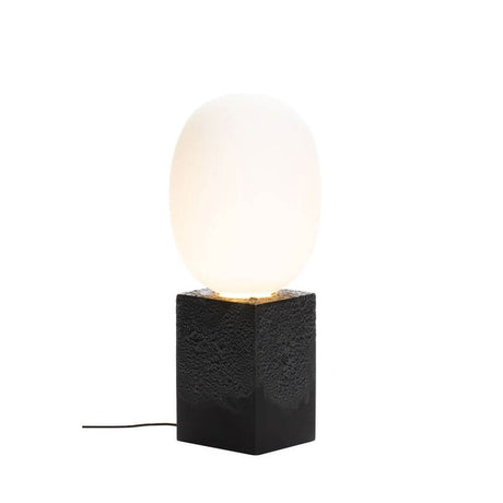 Pulpo LED table lamp Magma One High Ø 30cm H 69cm with smooth and rough design.