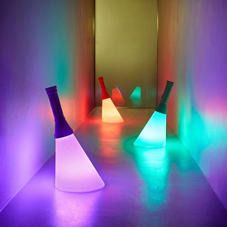 Flash battery LED table lamp with remote control glows in colorful lights in the hallway.