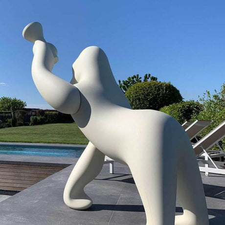 Kong XL floor lamp gorilla as a stylish floor lamp for outdoor use with an adjustable arm.