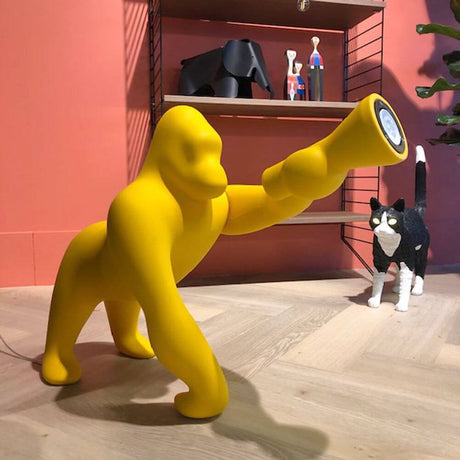 Kong XS table lamp Gorilla in yellow, unique design for atmospheric indoor lighting.