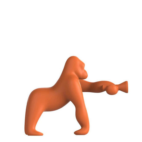 Kong XS table lamp Gorilla in orange, creative table lamp with adjustable arm for lighting.
