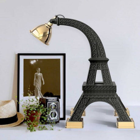 Paris M table lamp Eiffel Tower 60 cm with adjustable brass diffuser on a table.