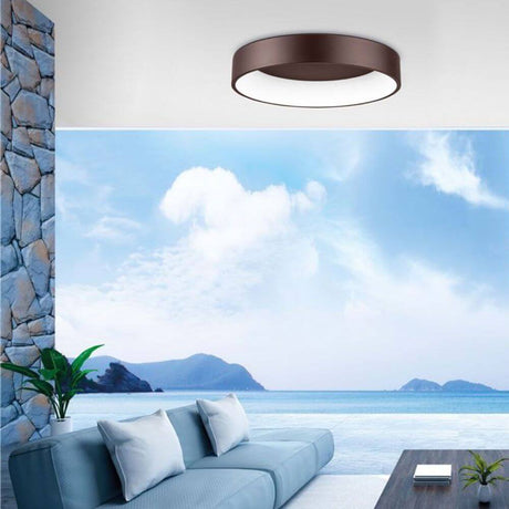 LED Deckenleuchte Rando Ø 60cm 2520lm , 3000K Braun in modernem Wohnraum mit Meerblick.