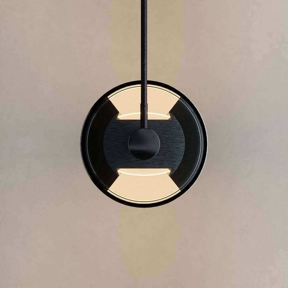 Moderner runder Pendelleuchte mit schwarzem Design und warmem Licht, ideal für stilvolle Innenräume.