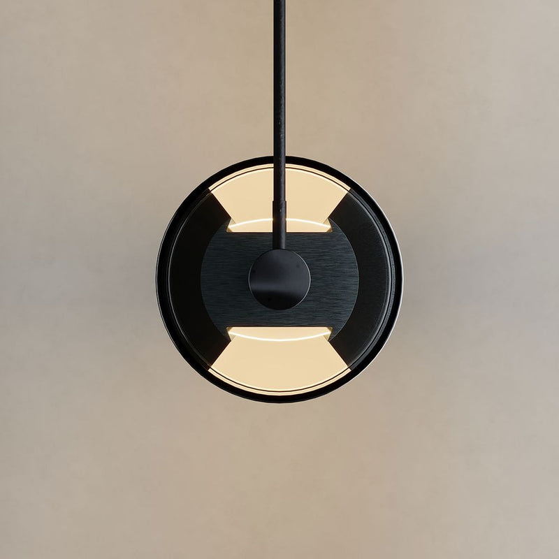 Moderne schwarze Pendelleuchte mit runder Form und sanftem Licht, ideal für stilvolle Inneneinrichtung.