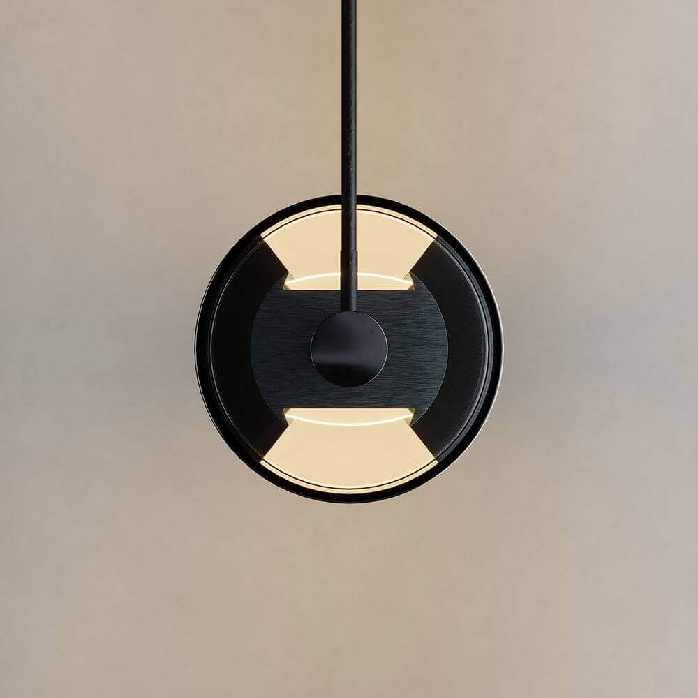 Moderne schwarze Pendelleuchte mit runder Form und sanftem Licht, ideal für stilvolle Inneneinrichtung.