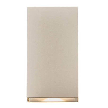 Rold Flat LED Wandleuchte IP54 in minimalistischem Design, produziert warmes Licht nach oben und unten.