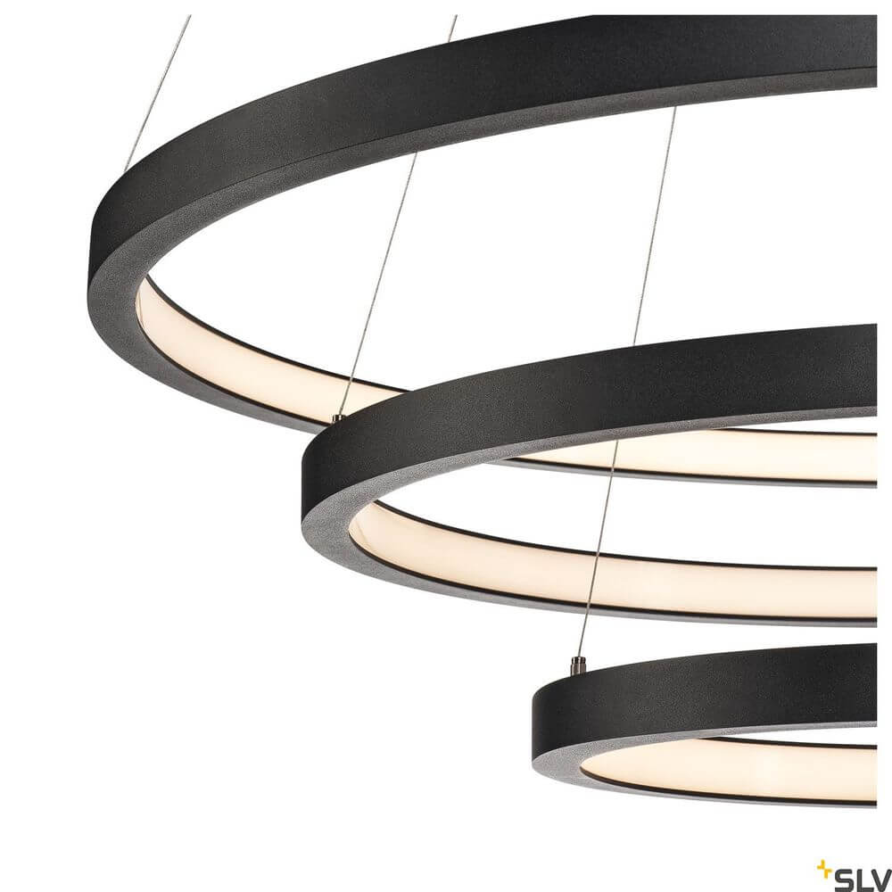 One Triple Pendellampe Dali 3000/4000K Schwarz - moderne, elegante Beleuchtung in Schwarz mit drei LED-Ringen.