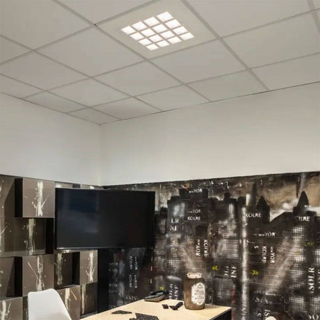 Pavano 620 ceiling light White 4000K on a modern office ceiling with a graphic wall in the background.