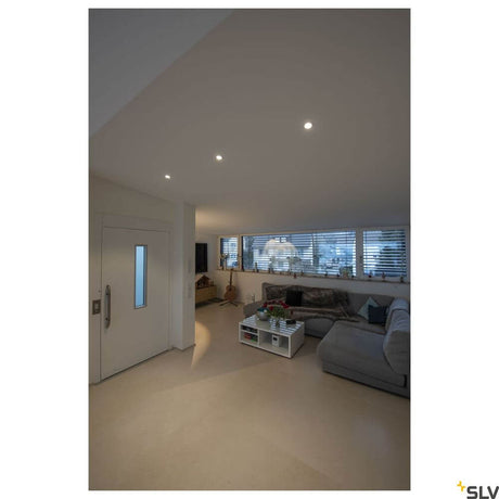 Senser 12 recessed ceiling light 3000K round white in modern living room design with bright lighting.