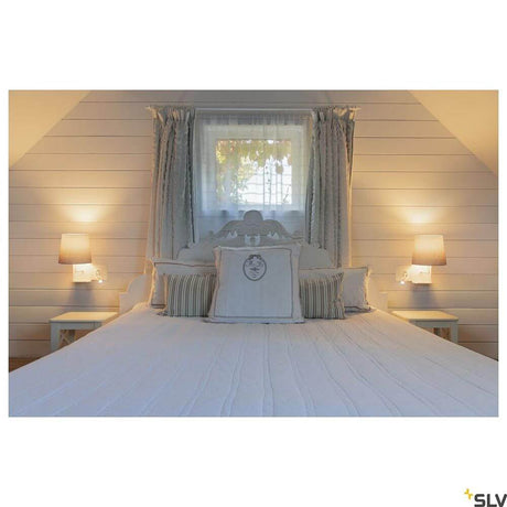Bedroom with Somnila Flex LED wall-mounted light White incl. USB, elegant design and cozy lighting.
