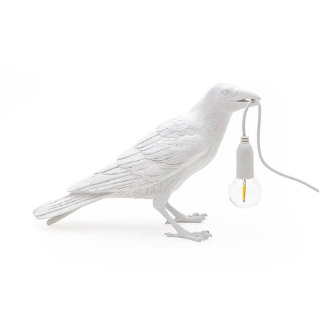Lampe de table d'extérieur Seletti Bird en forme de corbeau blanc avec une ampoule, conçue par Marcantonio.