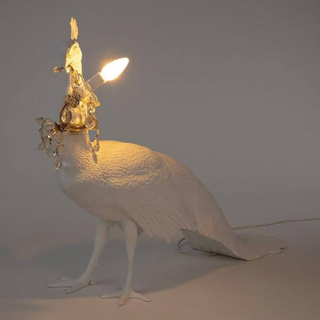 Seletti Peacock floor lamp White dimmable as a decorative floor lamp in the shape of a white peacock.