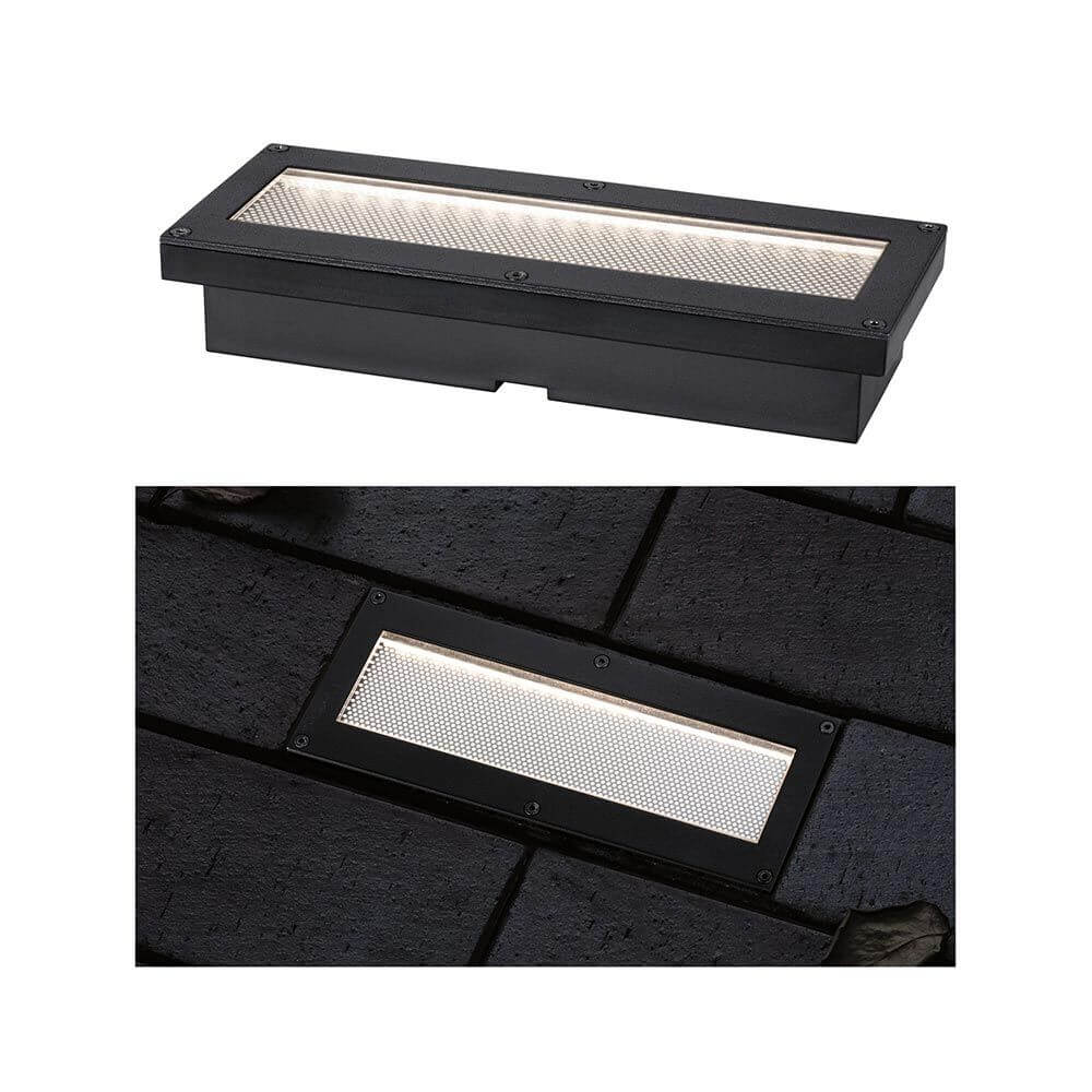 Solar LED Bodeneinbauleuchte Domenic Rechteckig Schwarz IP67 auf Pflasterstein, strahlendes diffuses Licht.