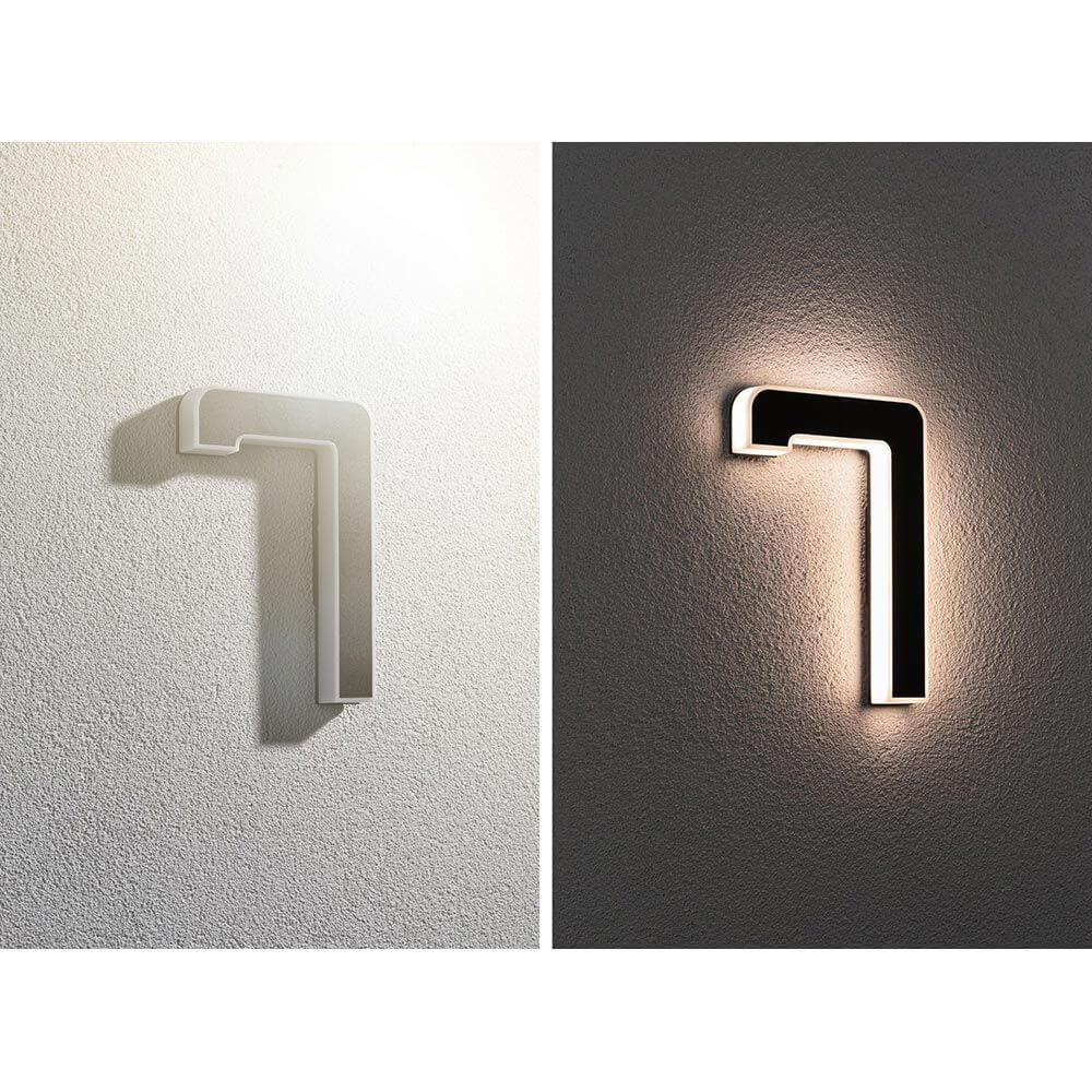 Solar LED Hausnummernleuchte Nummer 7, elegante Hausnummernbeleuchtung, tagsüber aufgeladen, indirekte Beleuchtung bei Nacht.