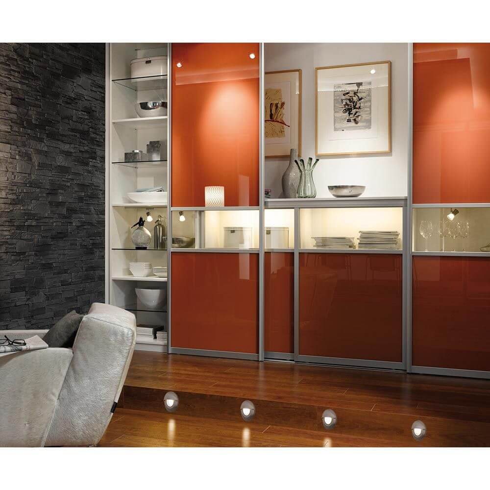 Moderne Wohnwand mit LED-Beleuchtung und rundem Special EBL LED Abdeckung Cap rund 87mm Edelstahl.