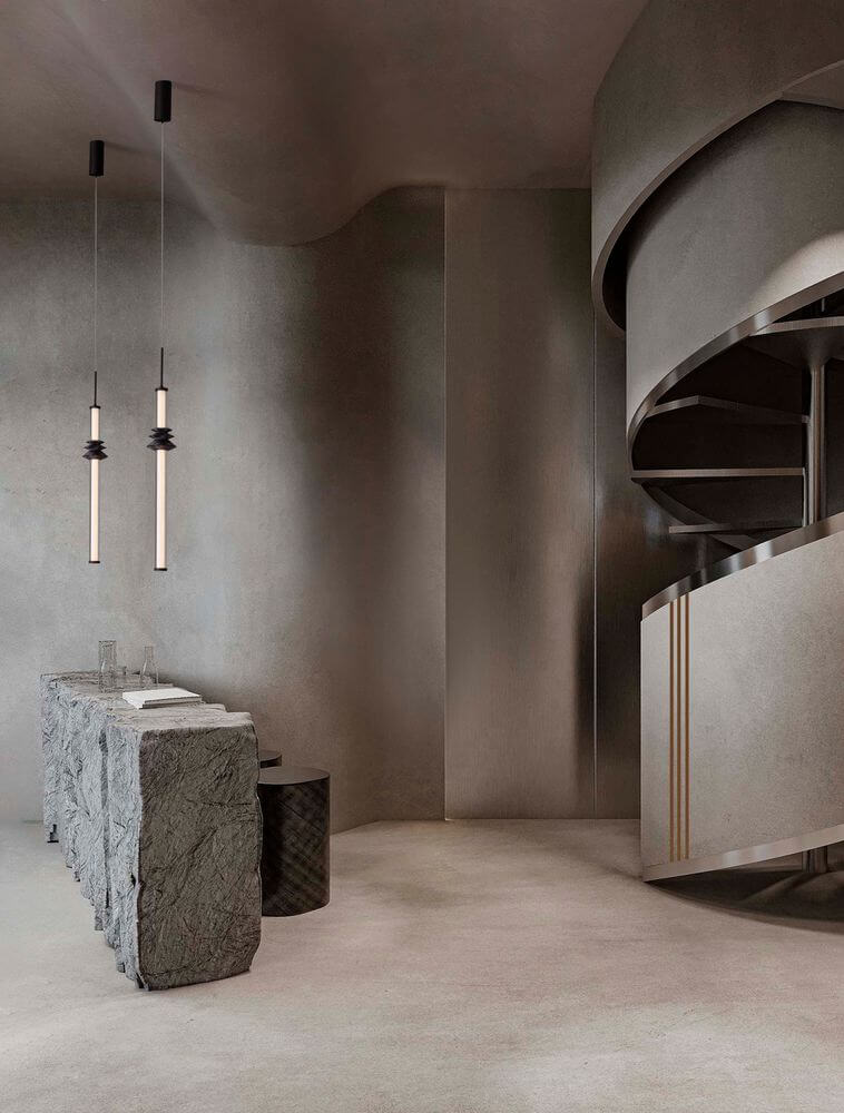 Stalactite Pendelleuchte Vertikal Ø 4,5cm 3000K Schwarz im modernen Interieur mit geschwungener Treppe.
