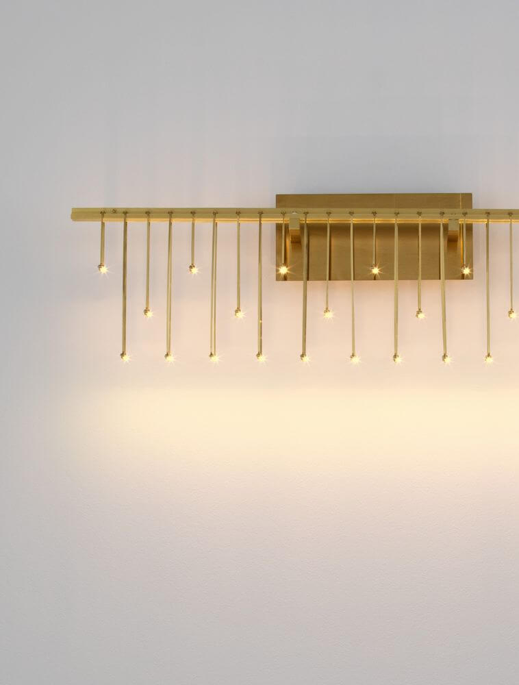 Stellar LED Wandleuchte 25-flammig 3000K in elegantem Design mit goldenen Elementen.
