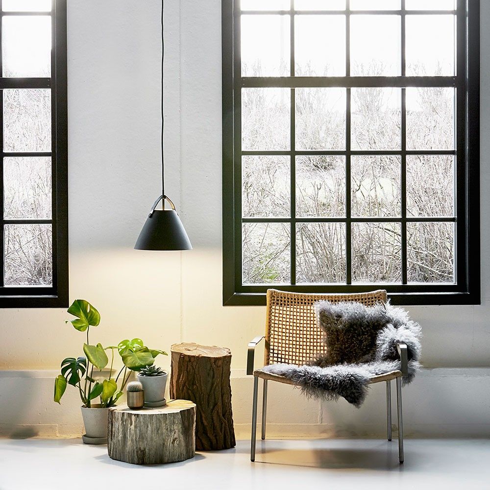 Strap 36 pendant lamp Ø 36cm with 2 leather straps black in a stylish interior with windows.