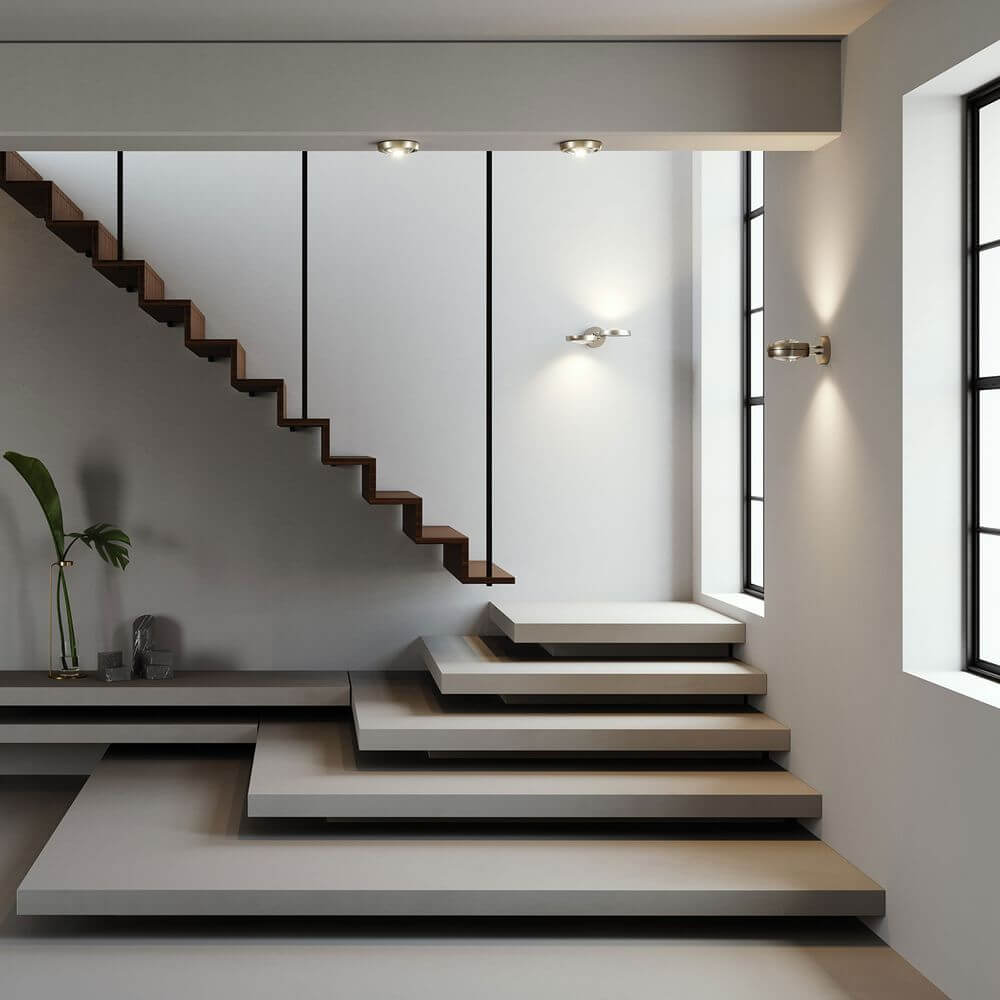 Moderne Treppe mit Lodes Nautilus LED Wandlampe 2300 Lumen, Oberflächenbeleuchtung und minimalistischen Design.