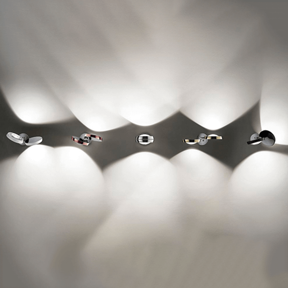 Lodes Nautilus LED Wandlampe 2300 Lumen mit modernem Design und konvexer Linse für personalisierte Beleuchtung.