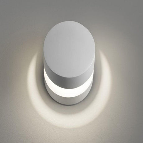 Lodes Pin-Up LED adjustable wall lamp with a clear design and flexible LED light sources for room illumination.