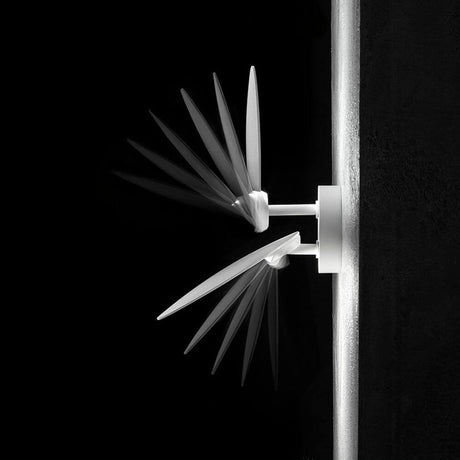 Lodes Puzzle Round Outdoor Double LED wall light with movable wings on the wall, modern outdoor lighting.