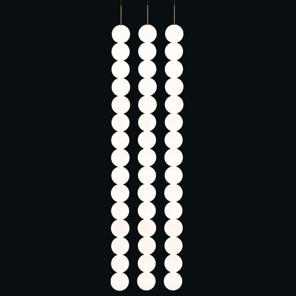 Terzani Abacus LED Design-Hängelampe 3er mit modernen, minimalistischen Pendelleuchten in drei Reihen.