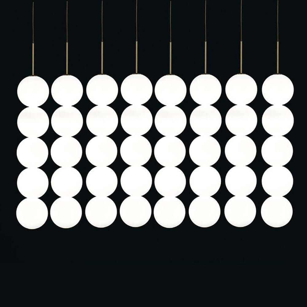 Terzani Abacus LED Design-Hängeleuchte 5er mit modularen pendelnden Lichtern in klarer, funktionaler Form.
