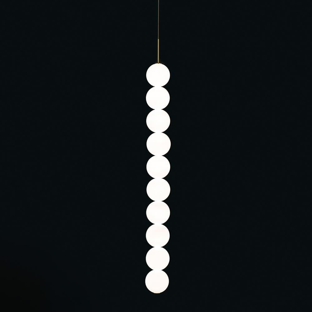 Terzani Abacus LED Design-Pendelleuchte 1er im modernen, minimalistischen Stil mit künstlerischen Lichtelementen.