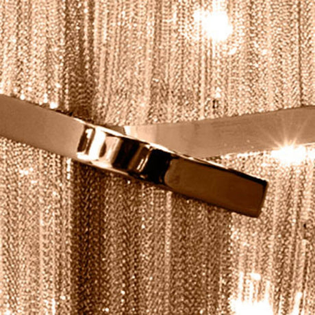 Terzani Atlantis Designer-Hängelampe im Detail, mit schimmernden Metallscheiben und elegante Lichtreflexionen.