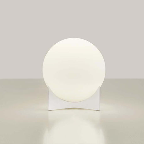 Terzani Oscar design table lamp with a spherical diffuser and a modern, minimalist design.