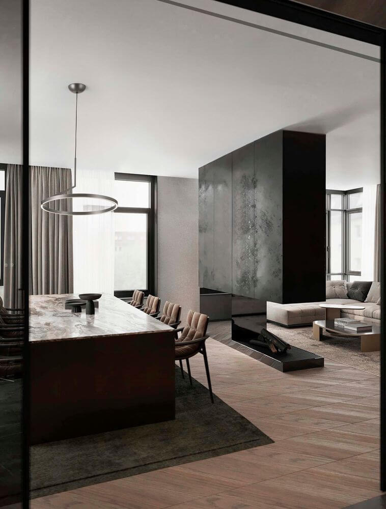 Moderne Ess- und Wohnbereich mit eleganter Pendelleuchte und stilvollem Interieur in neutralen Farbtönen.