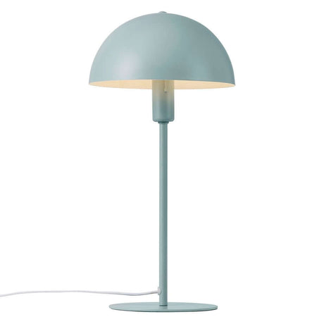 Lampe de table Ellen vert pastel au design scandinave avec abat-jour arrondi et cadre moderne.